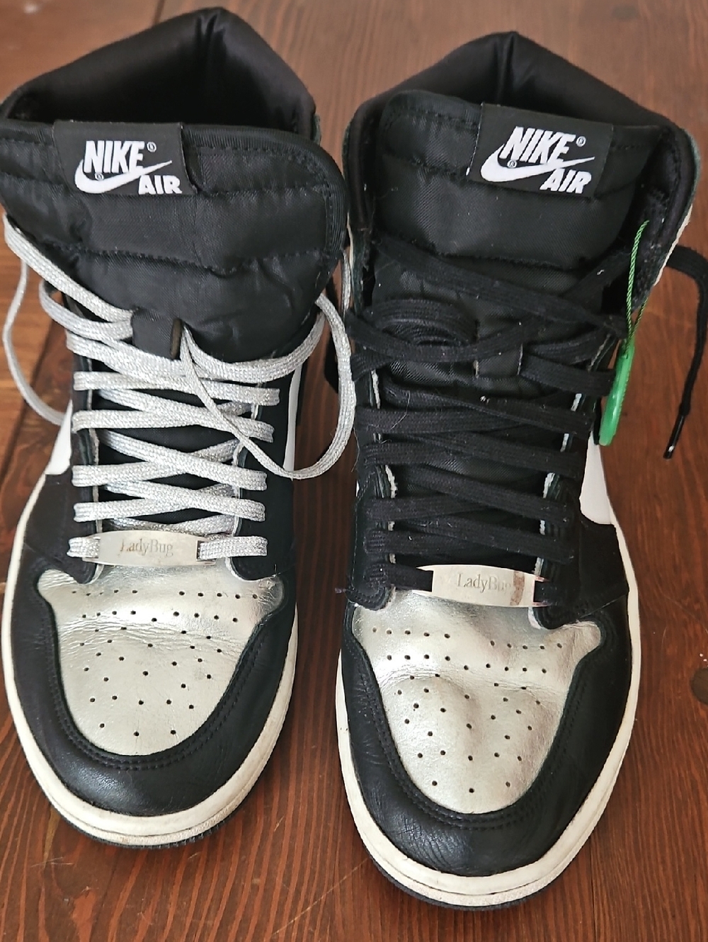 Nike High-Top Sneakers in Black and Metallic Silver with Dual Lace Set